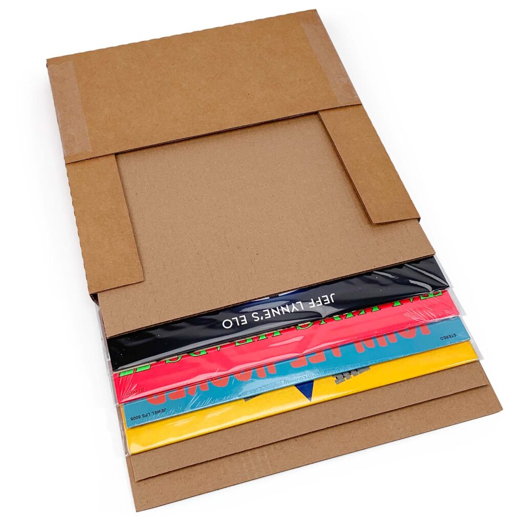 Albums in BCW wrap mailer with pads
