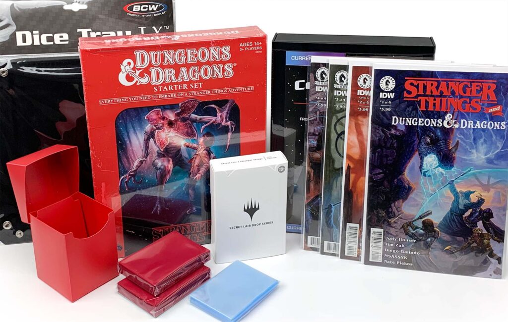 Stranger Things comics, MTG cards, and D&D set with BCW accessories
