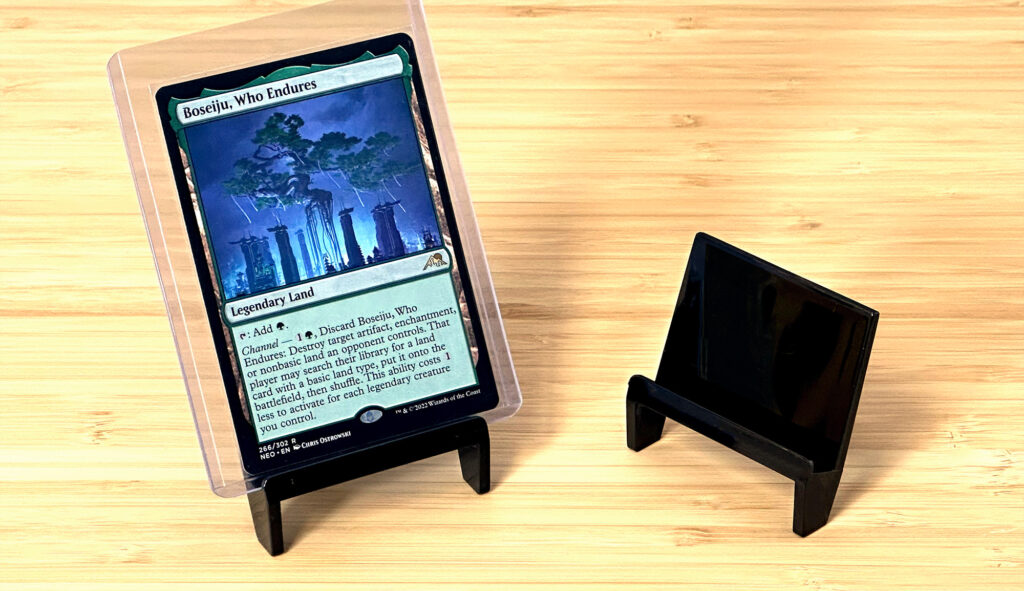 Magic The Gathering card in toploader with Pro-Mold card stands
