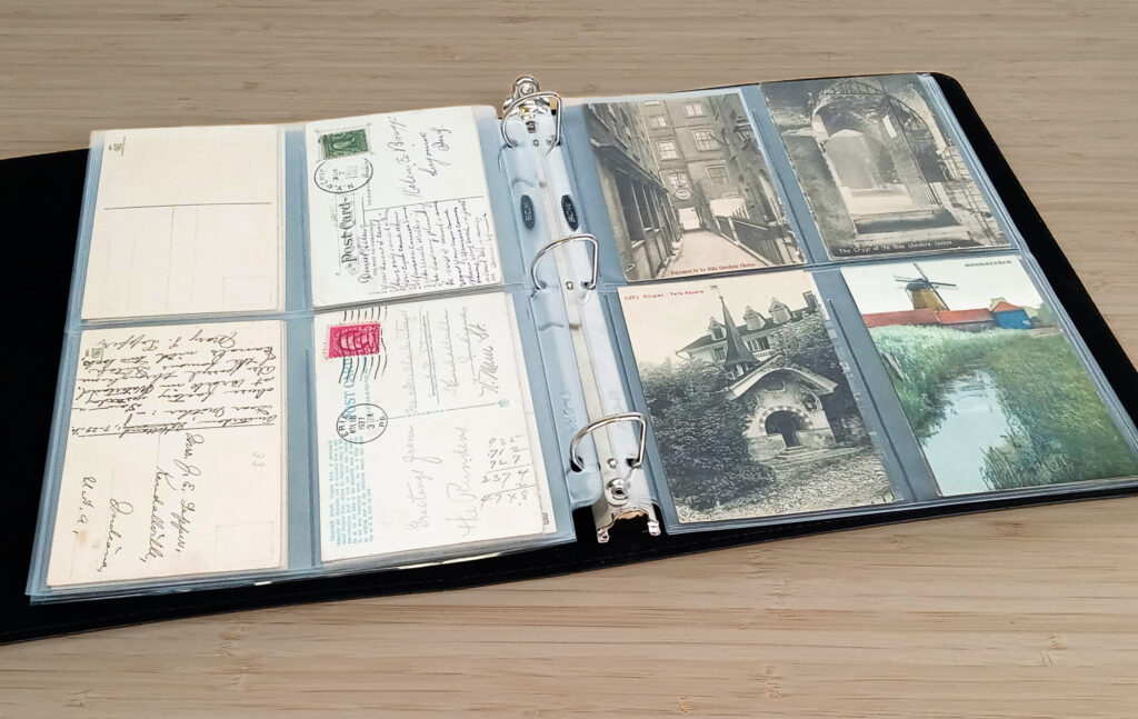 Postcards in 3-ring binder pages