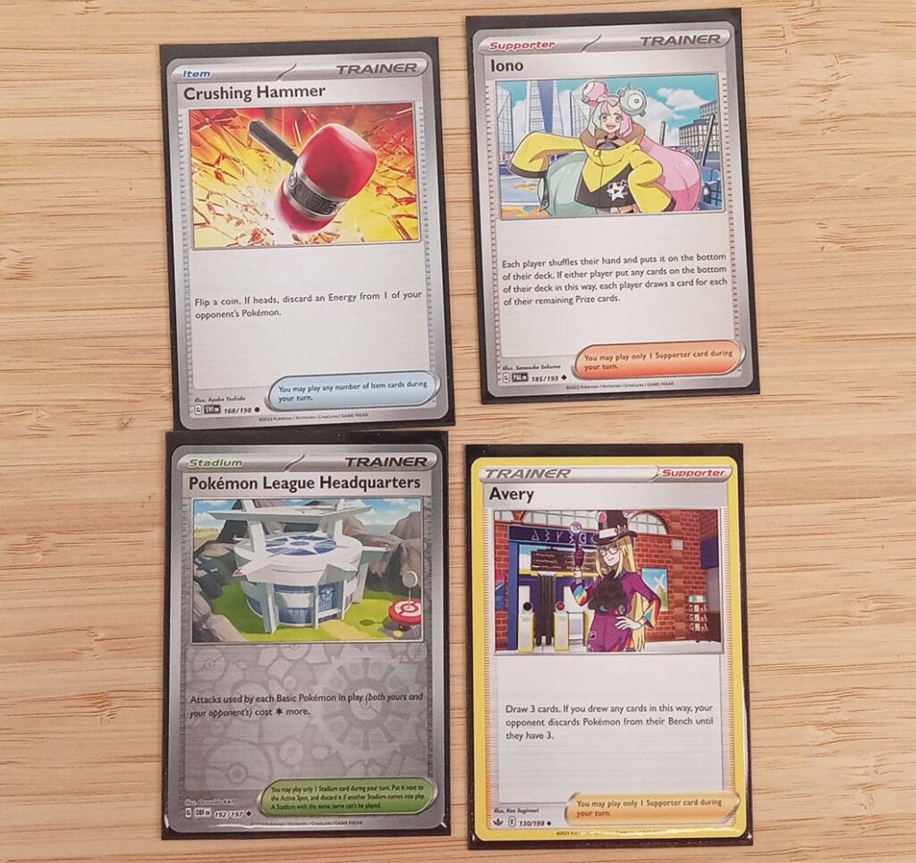 Crushing Hammer, Iono, Pokemon League Headquarters, and Avery cards for the Pokemon tcg
