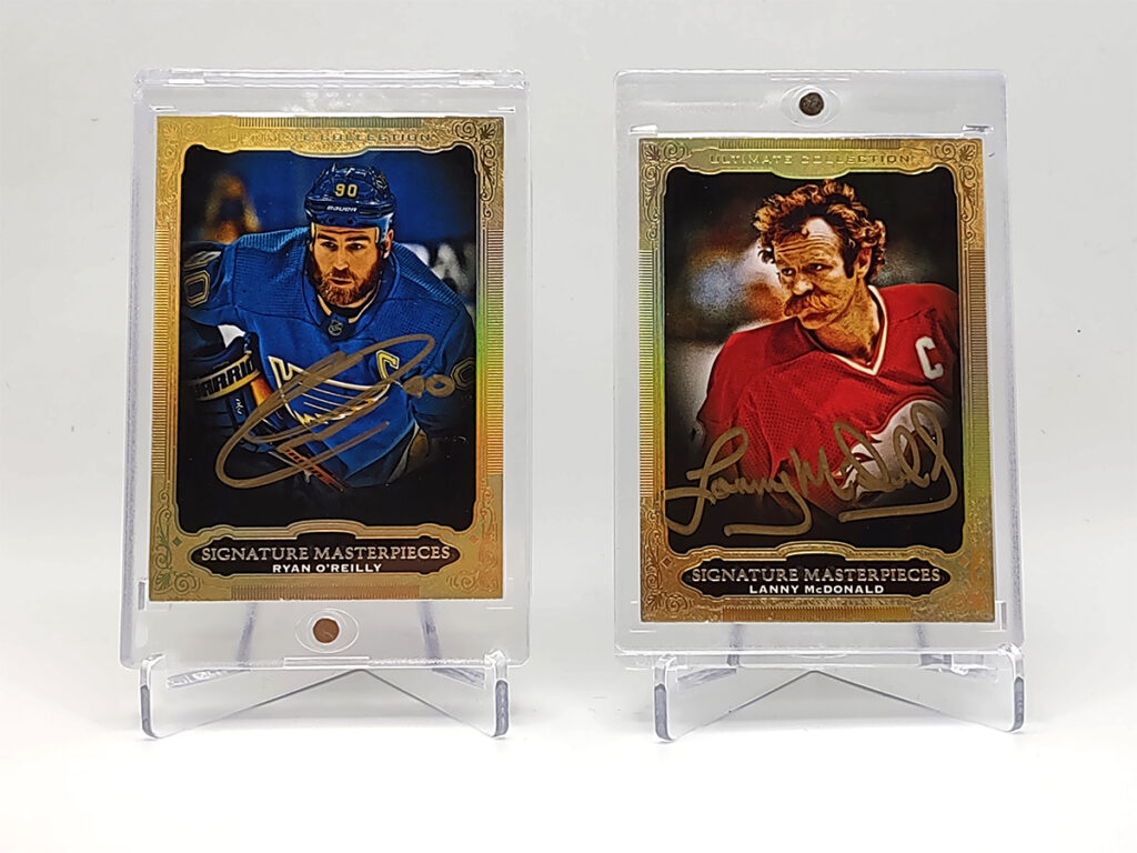 Signed hockey cards on display.