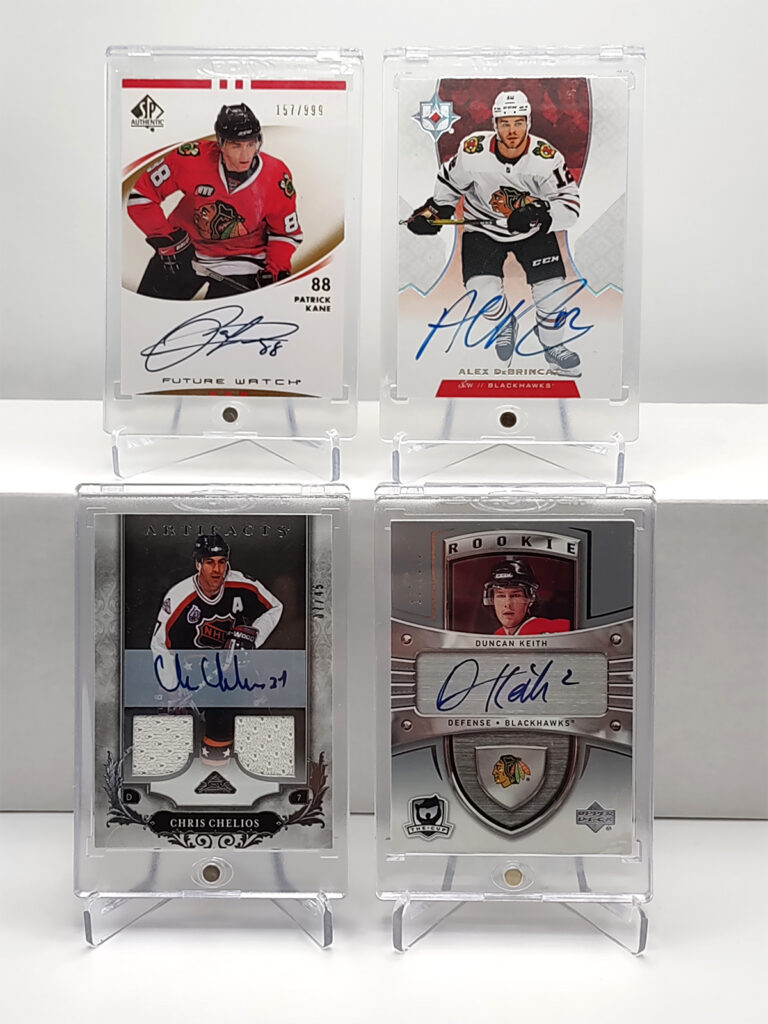 Hockey cards on card storage boxes used as risers.