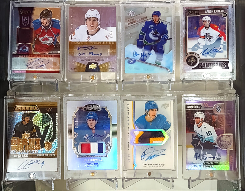 Assorted hockey cards on display.