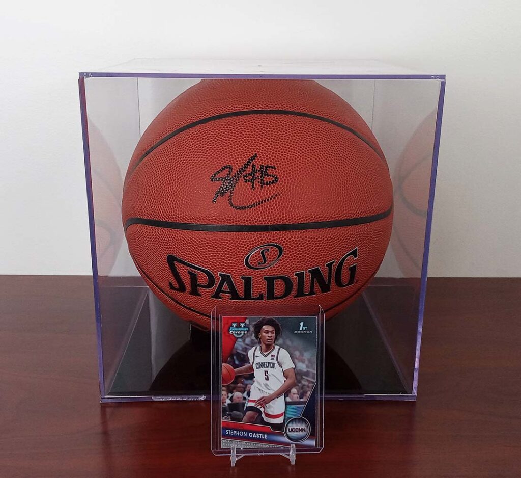 Stephon Castle card and signed basketball in BCW basketball showcase